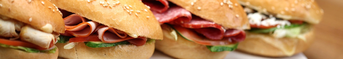 Eating Breakfast & Brunch Deli Sandwich at Lucy's Cafe & Grill.